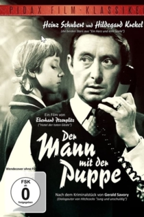 Der Mann mit der Puppe